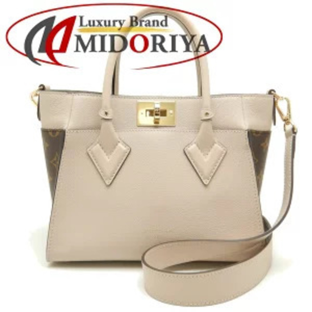 Louis Vuitton On My Side Handbag Greige Gray